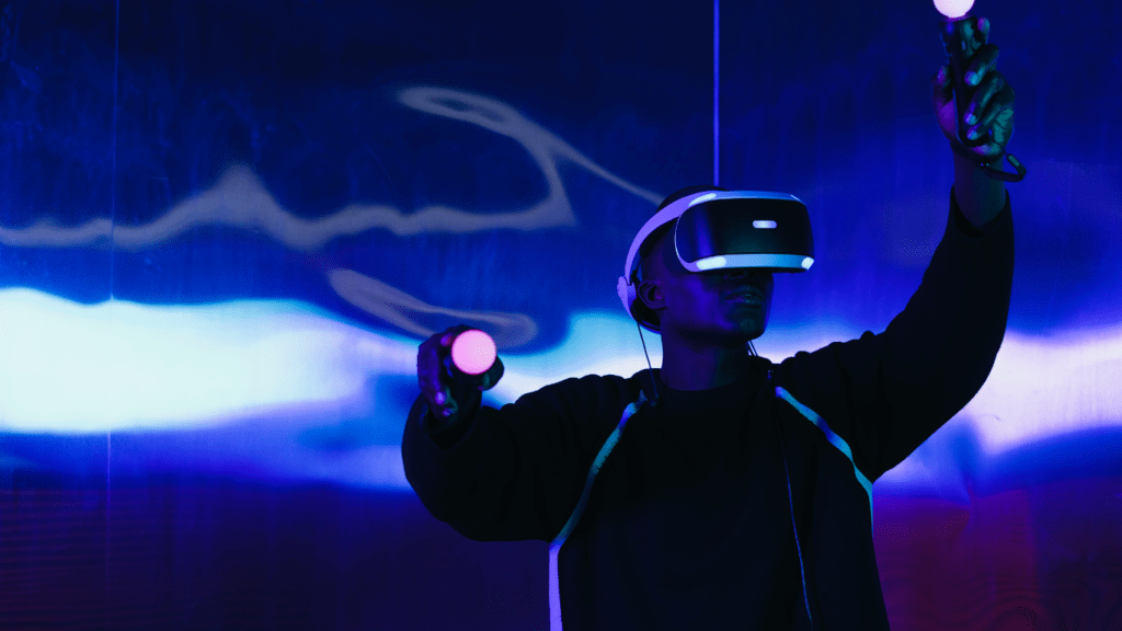 A person wearing virtual reality headsets