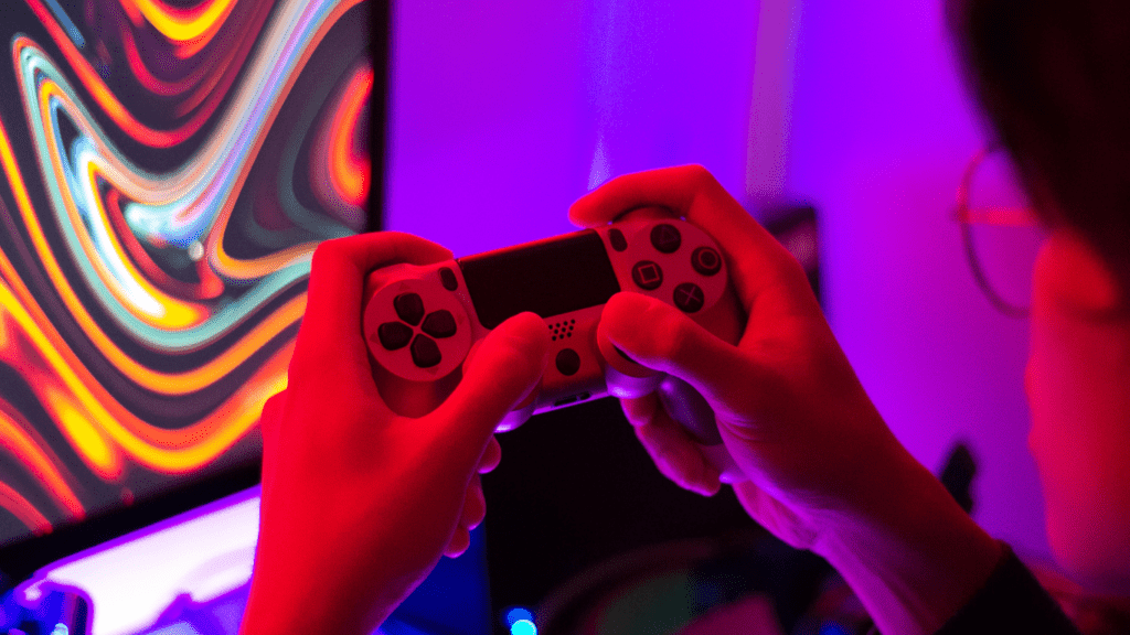 a person holding a video game controller